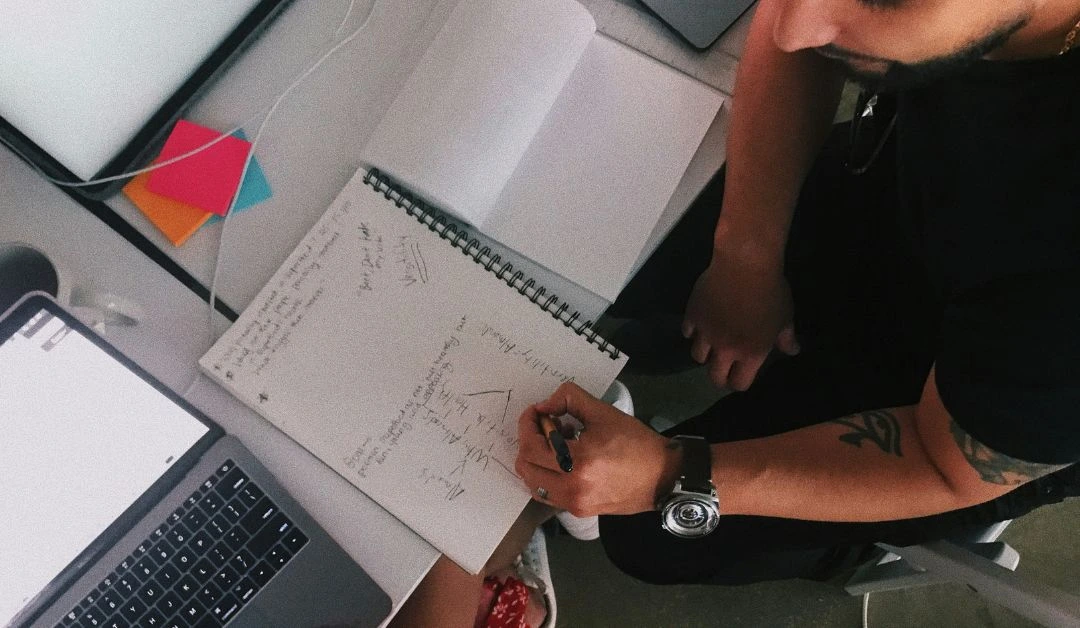 Nashville web developers collaborating in a creative workspace, using AI tools to drive web innovation and design breakthroughs.