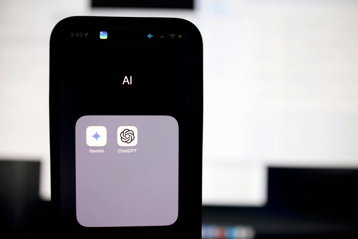 Mobile device displaying AI apps on screen